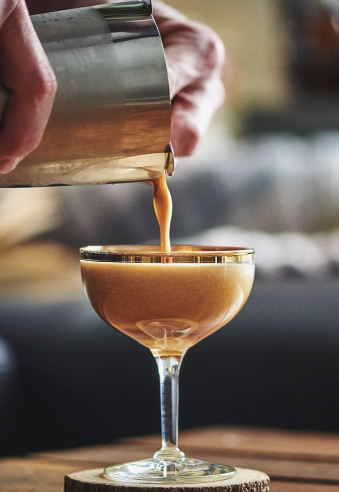 A dairy-free espresso martini crafted with OATRAGEOUS Espresso Oat Milk liqueur.
